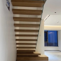 Escalier en bois massif en forme de L moderne, préfabriqué en usine, flottant en extérieur, avec marche et contremarche à poutre simple pour appartement