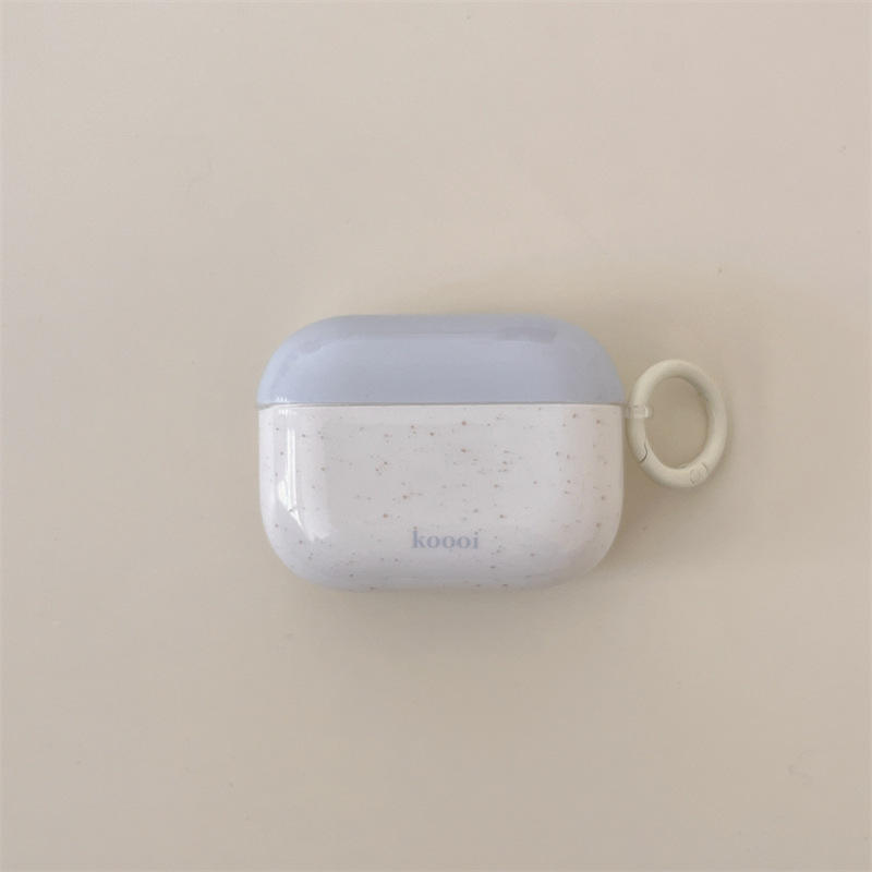 Coque unique avec éclaboussure d'encre bleue et blanche.