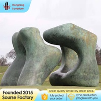 Grande sculpture de jardin extérieure en bronze coulé, abstraite, simple et non sophistiquée, en forme de cercle, résistante au vent