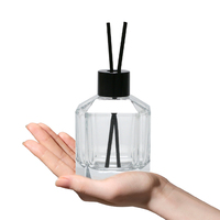 Flacon diffuseur de parfum en verre transparent de forme unique de 100 ml, fond épais, avec bouchon et capuchon