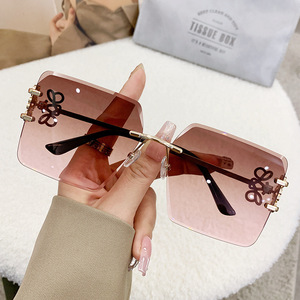 Fashion Frameless <b>Oversized</b> <b>Sunglasses</b> Gold Metal Bow Polygonal Design Women UV400 Light Weight - Product Image 1