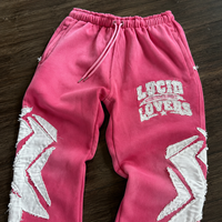 Survêtement rose zippé pour homme avec broderie lettres appliquées, patchwork à bords bruts et pantalon de survêtement large – Vente en gros