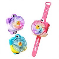 Montre pour enfants au design de dinosaure de dessin animé, ventilateur portable à charge USB avec lumières, petit ventilateur à porter au poignet, cadeau pour les fêtes de maternelle