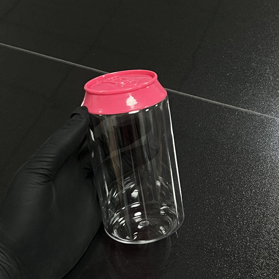 Botella transparente con tapa rosa