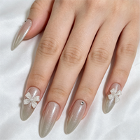 Vente en gros de faux ongles personnalisés à marque privée, forme amande, mauve ombré, effet œil de chat, nœud 3D, brillants