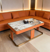 Table basse de luxe moderne avec plateau en marbre, structure en acier inoxydable doré et pieds recouverts de cuir pour salle VIP KTV