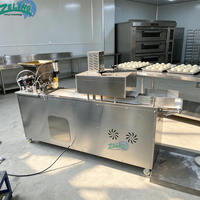 Machine commerciale de découpe et de façonnage de pâte 1-500g par pièce 2,025 kW pour le traitement de la pâte à pain, à brioches et à pizza