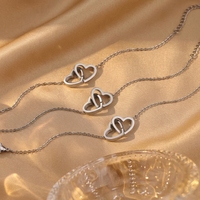 Bracelet en alliage à double anneau entrelacé en forme de cœur, style international, best-seller, avec double fermoir, également utilisable comme bracelet de cheville, cadeau sur le thème de l'amour, bijou de main