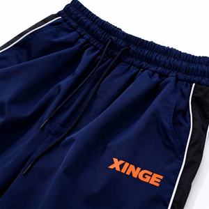 กางเกงวอร์มขาบานสไตล์ลำลองแบบใหม่ปี 2026 แต่งแถบข้างตัดสี ทำจากไนลอน เหมาะสำหรับใส่เล่นกีฬาและสวมใส่ทั่วไปในทุกฤดูสำหรับผู้ชาย - Product Image 2