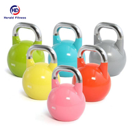 Kettlebell en acier coloré pour l'entraînement sportif, la perte de poids, le renforcement des fessiers et les squats en salle de sport