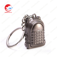 En gros Promotionnel Personnalisé Métal Jeu Jouets Porte-clés Pistolet Casque Modèle 3D Mini PKM Porte-clés En Métal