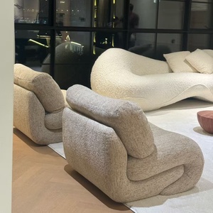 เก้าอี้ผ้าหุ้มทรงโค้งคล้ายงู พร้อมเบาะนุ่มสบาย ดีไซน์มินิมอลสไตล์วาบิซาบิ เหมาะสำหรับห้องนั่งเล่นที่อบอุ่น - Product Image 3