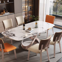 Table à manger rectangulaire en pierre frittée brillante de luxe léger, style célébrité internet, en acier au carbone, mobilier de maison assemblé