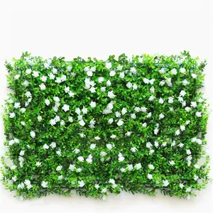 M309 sıcak satış dekoratif beyaz çiçek duvar panelleri yeşil plastik açık yapay yeşillik bitkiler çim duvar dekor için