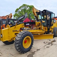 Niveleuse à moteur CAT 140K d'occasion, Caterpillar 140K 140H, niveleuse de construction routière avec peu d'heures de fonctionnement, à vendre