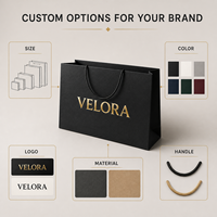 Sacs en papier personnalisés imprimés 70 g/m² en carton recyclable avec poignées en corde et logo personnalisé en feuille d'or pour la vente au détail de luxe et la vente en gros