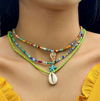 Collier tendance transfrontalier en coquillage et pierre naturelle, style bohème, avec pendentif conque perlée et étoile de mer, chaîne de clavicule