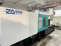 Machine de moulage par injection entièrement automatique d'occasion pour récipients alimentaires Paniers de fruits Moteur de pré-moulage de bureau Pompe à vis PLC