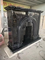 Cheminées sculptées à la main en granit noir de luxe Cheminée en pierre naturelle décorative d'intérieur