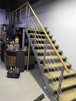 Escalier en acier et bois à double poutre |   Structure hybride avec marches en bois et poutres en acier