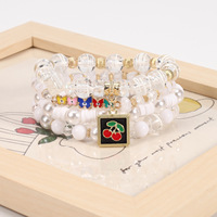 Ensemble de bracelets perlés en alliage de zinc avec strass en cristal, style bohème, imitation perle, breloques cerise et papillon, pour femme