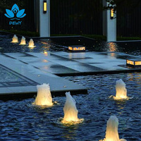 Petite fontaine à jets d'eau moderne multi-tension en acier inoxydable pour terrasse extérieure et piscine paysagère
