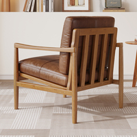 Fauteuil Rosegia en cuir de style moderne du milieu du siècle, structure en bois massif, assise rembourrée marron, chaise longue écologique pour chambre et appartement