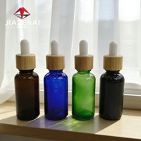 Flacon d'huile essentielle de 30 ml avec bouchon en bois, brun foncé, bleu, vert, flacon en verre opaque avec compte-gouttes pour emballage individuel, disponible en stock