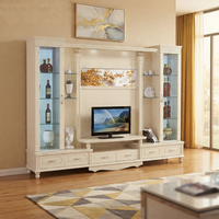 Meuble TV extensible moderne et minimaliste en bois blanc avec éclairage LED à couleur réglable et étagères, à poser au sol pour salon