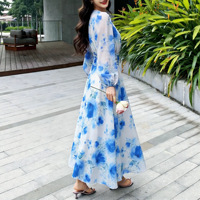 Robe longue féerique élégante à manches longues en double mousseline imprimée, style français, amincissante, motif floral, collection été 2026