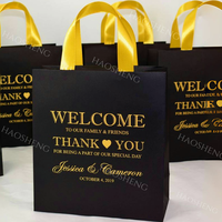 Sacs-cadeaux personnalisés en or gaufré UV de luxe doré Sacs en papier exquis pour mariage Sacs en papier noir professionnel
