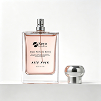 Flacon de parfum rectangulaire de luxe en verre épais de 100 ml (3 oz) avec capuchon pulvérisateur à bille argentée pour emballage de parfum