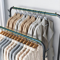 Séchoir à linge simple pour balcon et chambre, ne prend pas de place au sol, avec cintres métalliques et porte-manteaux