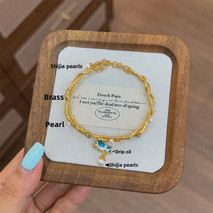 <span class=keywords><strong>Bracelet</strong></span> élégant de style vintage avec motif papillon en émail goutte d'huile et <span class=keywords><strong>perles</strong></span> simulées, décoration de main simple et de haute qualité pour femmes - Product Image 3