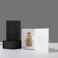 Emballage personnalisé pour huile de parfum pour homme, boîte-cadeau magnétique de luxe recyclable doublée d'une éponge avec logo imprimé en or noir