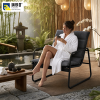 Fauteuil d'extérieur en métal noir avec base en forme de traîneau et coussin anthracite