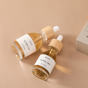 Chai tinh dầu thủy tinh trong suốt Vanjoin Custom 30ml 50ml 100ml, có thể tái sử dụng, kèm nắp nhỏ giọt bằng tre - Product Image 1