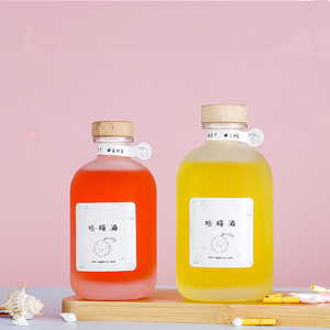Botella de Vidrio Vacía para Bebidas al por Mayor, 250 ml, 350 ml, 500 ml, Transparente, Esmerilada, Redonda, Personalizada, con Tapón de Corcho - Product Image 1