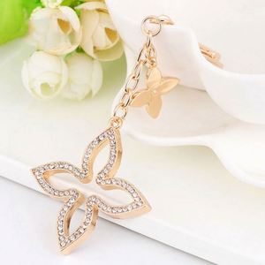 Llavero de Trébol con Cristales Brillantes y Pedrería, Hermoso Llavero de Metal con Trébol, Colgante de Moda para Bolsos de Mujer - Product Image 1