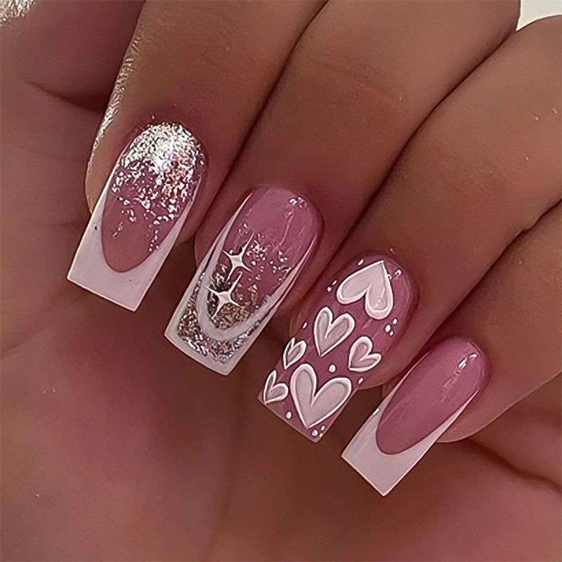 Calidad Premium uñas rosas con corazones blancos para Compradores