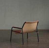 Fauteuil lounge en cuir pleine fleur tanné végétal, design danois moderne, pour projet hôtelier 5 étoiles, idéal pour salon.