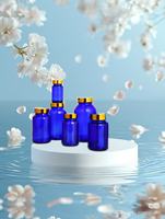 Vente en gros de 75ml 100ml 120ml 150ml 200ml 250ml 300ml 400ml 500ml Capsule pharmaceutique en verre bleu avec bouchon à vis