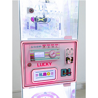 Machine de jeu de type grue d'arcade avec des prix en peluche et un système de fonctionnement à pièces - Construction durable pour une utilisation à long terme