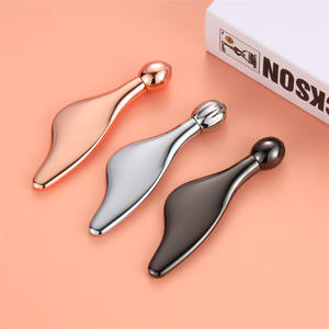 Outil de <span class=keywords><strong>massage</strong></span> facial Gua Sha en alliage de zinc personnalisé pour sculpter le <span class=keywords><strong>visage</strong></span>, grattoir Gua Sha avec rouleau pour le <span class=keywords><strong>visage</strong></span> - Product Image 1