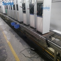 Ligne d'assemblage de distributeurs d'eau haute vitesse pour distributeurs d'eau chaude/froide avec station de test de tenue