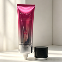Tube souple rose nacré pour cosmétiques avec bouchon à vis doré pour crème visage, lotion, massage, hydratation, soins de la peau, vide et personnalisable