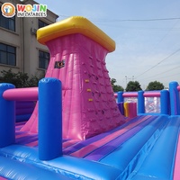 Parc d'aventure gonflable coloré style fête foraine, en PVC robuste et durable, pour un business de location à fort retour sur investissement, avec château gonflable