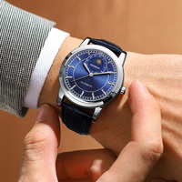 Fabrikverkauf: Elegante Automatik-Herrenuhr mit Mondphase, individuellem Logo, Saphirglas und echtem Leder – Mechanische Dress-Uhren