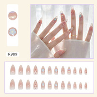 Approvisionnement direct usine Faux ongles en résine bleue, motif fleur, ligne contrastante, pois, diamant, ODM