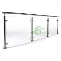 Système de balustrade en acier inoxydable au design moderne mains courantes au fini satiné et rampe en verre pour escaliers